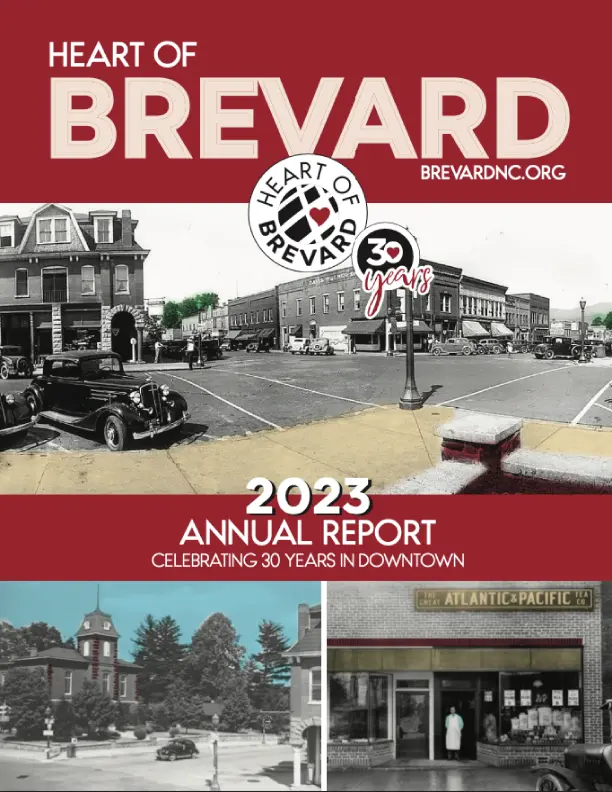 Old black and white photo of Downtown Brevard from the 40's showing old cars parked and a street with old buildings.