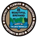Emblem for Beautiful Brevard, displaying a scenic landscape with mountains and trees. Text reads "Founded 1861" and "The Land of Waterfalls." The border lists words: Industry, Flowers, Recreation, Opportunity, Arts, Education.